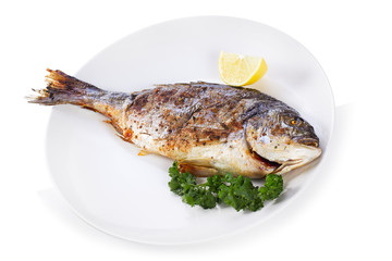 Grilled fish with lemon and parsley
