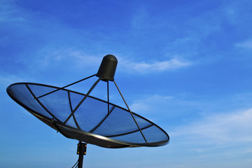 Satellite dish in morning sky