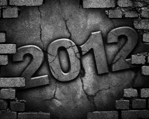 cracked wall with "2012" carving