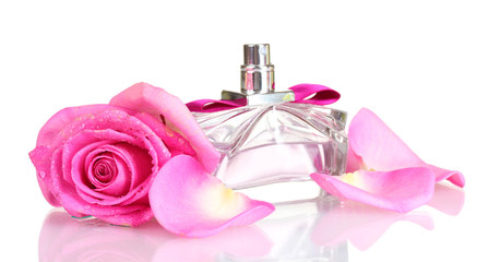 Perfume and pink roses on white background