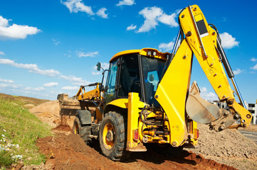 Obraz premium Excavator Loader with backhoe works