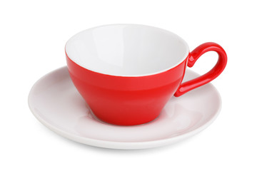 Empty red coffee cup on a saucer