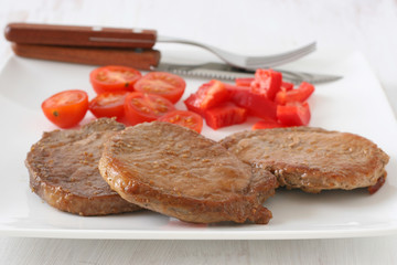 fried pork with tomato and pepper