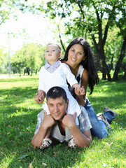 Fototapeta premium Family together in the summer park