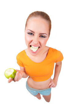 Young funny woman with green apple