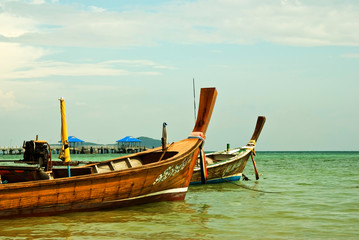 Fototapeta na wymiar Longtail boats on a tropical island near phuket