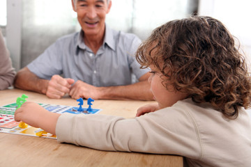 Young child playing a board game