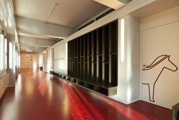 modern public school,  corridor red floor