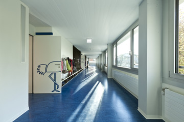 modern public school,  corridor blue floor