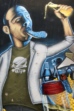 Arte urbano. Graffiti de un hombre en una pared