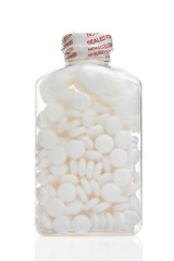 Sealed bottle of aspirin isolated on white