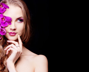 woman with an orchid