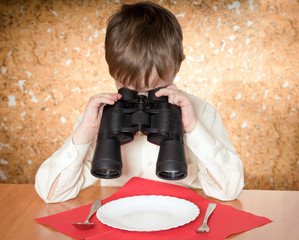 child with binoculars