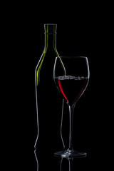 Glass and bottle of red wine