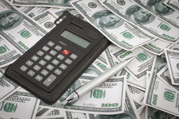 Fototapeta premium money calculator and pen background photo