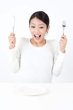 attractive asian woman with dish