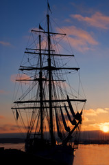 Tall ship silhouette at sunset