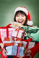 Christmas girl carrying presents