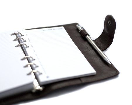 agenda en cuir ouvert annotation