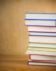 pile of new books on wood