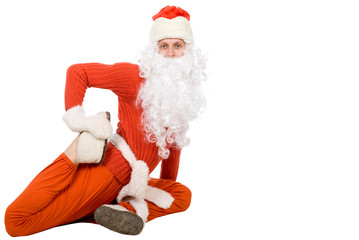 Santa Claus sit on half twine and stretching