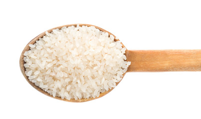 Fototapeta na wymiar rice grain in wooden spoon