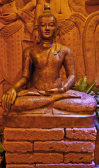 Red Buddha statue at Buddha Dharma Relics Museum