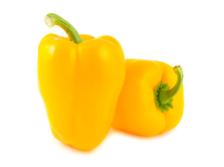 Two yellow peppers