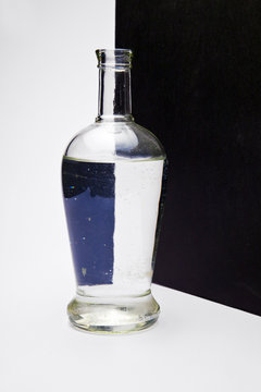 bottle with black and white pattern
