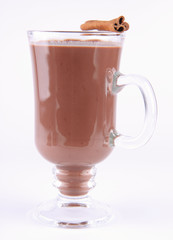 Cup of hot chocolate with cinnamon sticks