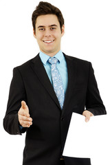 Charming young man handing out paper