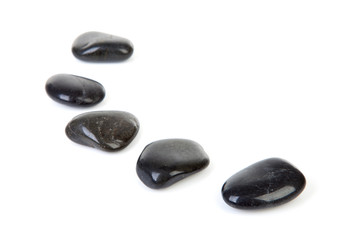 Black stepping stones in a row