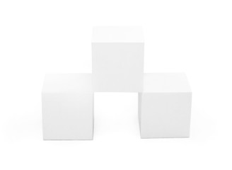 three white paper cubes