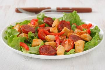 salad with chicken and sausages