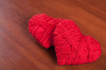 two red thread hearts