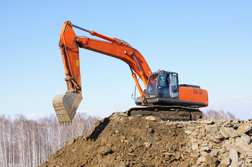 The dredge works on construction of new road