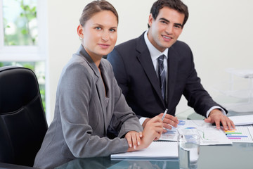 Young business team studying statistics