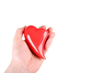 Obraz premium Herz in einer Hand / Herz Schenken