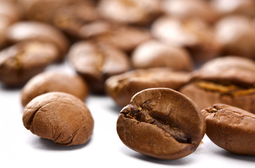 coffee beans closeup over white backgrounds