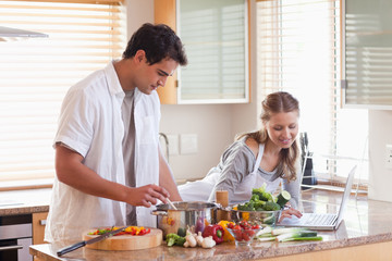 Woman looking up recipe up on the internet