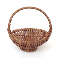 Wicker basket isolated on a white background.