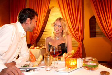 Couple dining in a fancy restaurant