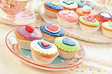 group of colorful cupcakes.