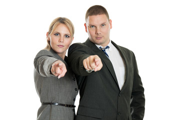 Business people pointing at the camera