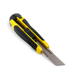 stationery knife yellow on a white background