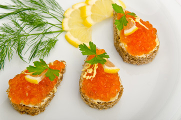 Red caviar served in the plate