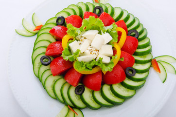 Cucumber and tomato salad in plate