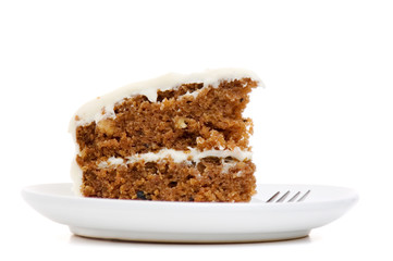 Homemade carrot cake slice isolated on white