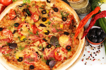 delicious pizza, vegetables and spices  isolated on white