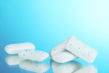 chewing gums on blue background